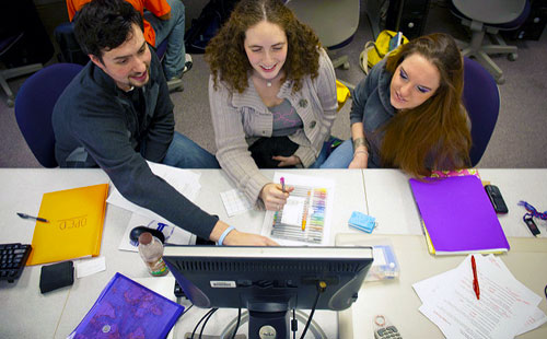 Geography students working at computer