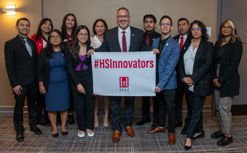 Medrano Jimenez with former Secretary of Education Miguel Cardona and fellow HSI education innovators