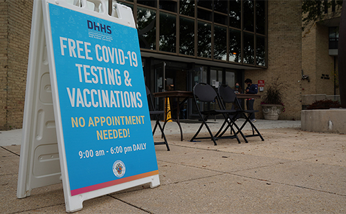 Sign showing where a COVID-19 vaccine and testing site is located